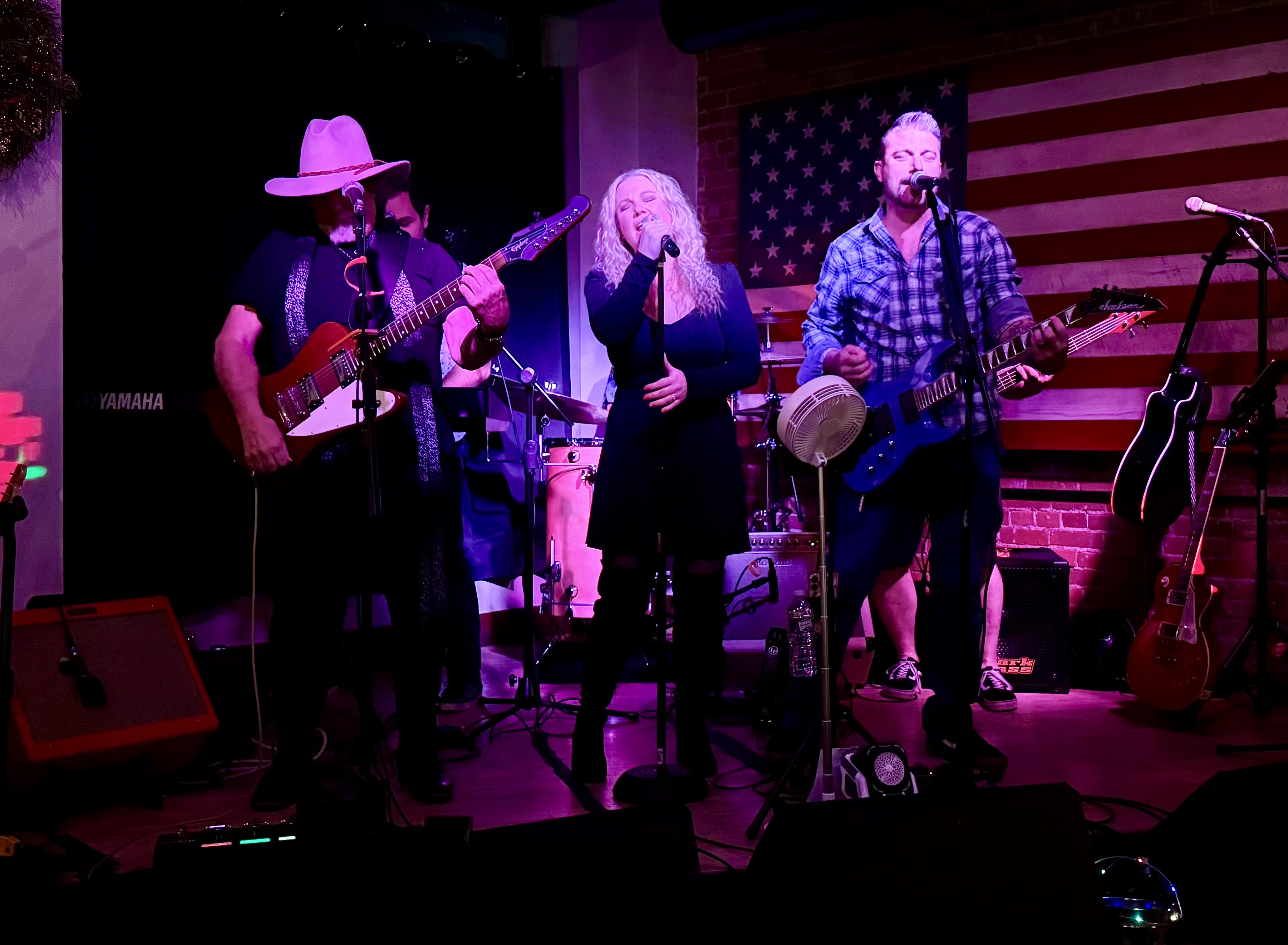 The Straight A’s Band performing for an event crowd