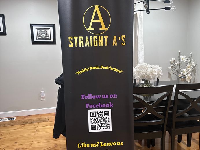 The Straight A’s Band performing live for a packed crowd