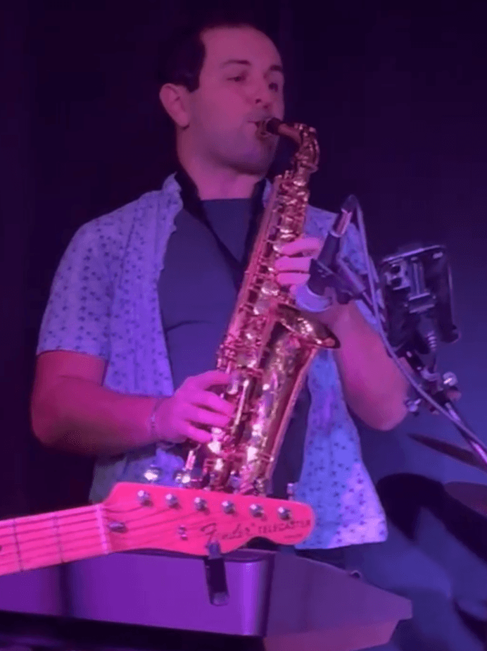 Live vocals and guitar performance by The Straight A’s Band